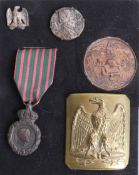 A French eagle belt buckle, Napoleon coin and three other objects. Part of the Late Reverend