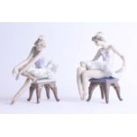 Lladro, a pair of seated ballerinas.