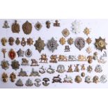 A collection of approx. 63 military cap badges including Grenadier, Coldstream, Irish, Scots and