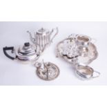 A collection of various silver plated wares, including three piece tea service, chamber stick