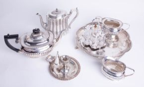 A collection of various silver plated wares, including three piece tea service, chamber stick