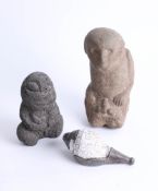 Two unusual stone primitive carvings and a conch shell with white metal mount, tallest 23cm.