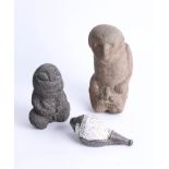 Two unusual stone primitive carvings and a conch shell with white metal mount, tallest 23cm.