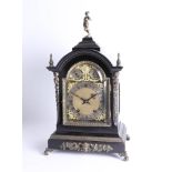 A Victorian ebonised and gilt metal mounted bracket clock with eight day movement striking on a