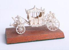 A modern silver model of a coronation coach, boxed, Toye, Kenning and Spencer Ltd.