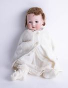 A German 'AM' doll with bisque head, open sleep eyes, open mouth, composition body, height 50cm.