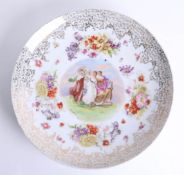 A Vienna style porcelain plate signed 'Kaufmann', diameter 35cm.