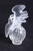 A Lalique glass scent bottle, signed.