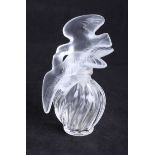 A Lalique glass scent bottle, signed.