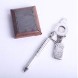 A silver chatelaine with vesta and propelling pencil together with a Ransones patent ink bottle in