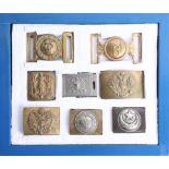 Eight military belt buckles including Russian and French. Part of the Late Reverend Geoffrey