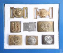 Eight military belt buckles including Russian and French. Part of the Late Reverend Geoffrey