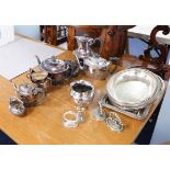 A collection of various silver plated wares including entree dishes and tea service.
