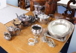 A collection of various silver plated wares including entree dishes and tea service.