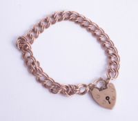A 9ct gold bracelet, with padlock clasp, together with some compacts and Ronson lighter, 13.8g.