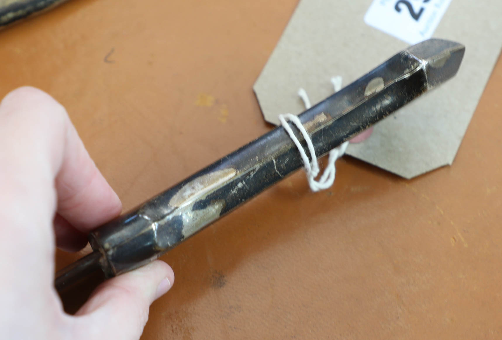 A dagger in white metal casing, marked 'Mosul 1942'. - Image 8 of 9