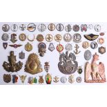 A collection of approx. 52 military cap and other French badges including Foreign Legion and