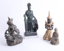 Four eastern figures, including Tibetan style Buddha and another marked 'Aohna', the tallest 29cm.