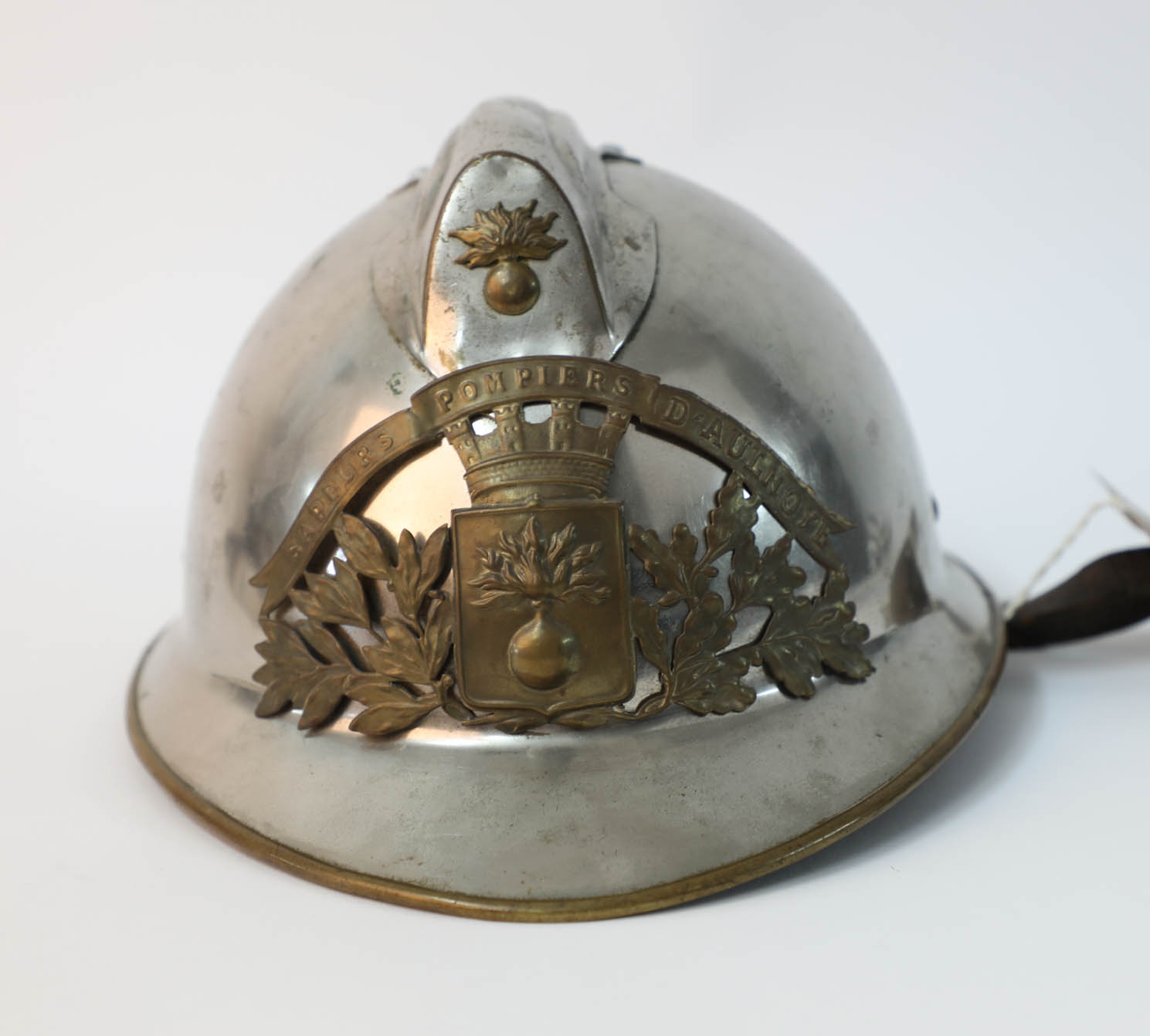 A French fireman's helmet, the crest marked Sapeurs Pompiers D'aulnoye and another helmet, marked - Image 2 of 15