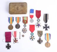 A Great War Christmas 1914 'Mary' tin containing various medals (some replicas) including enamel