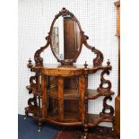 A Victorian figured walnut and mirror-back credenza, width approximately 141cm.