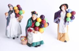 Royal Doulton, three figures, HN1843, Biddy Penny farthing, HN2935 Balloon Lady and HN1315 The Old