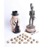 Royal Doulton, Winston Churchill character jug, military brass buttons, badges and a reproduction
