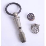 A rare railway key whistle marked 'December 15th 1868', together with a TGW badge.