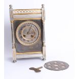 French brass case mantle clock, eight day movement, gong strike with key, height 28cm.
