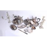 A quantity of silver plated wares including candelabra, tea service and tray.