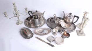 A quantity of silver plated wares including candelabra, tea service and tray.