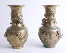 A pair of Chinese style ornate brass dragon vases, height 25cm.
