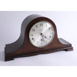 An oak-cased 1940s chiming mantle clock, sold by Bowden's of Plymouth.
