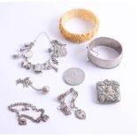 A silver charm bracelet and another, silver bangle, white metal vesta etc.