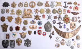 A collection of approx. 75 military cap and other badges of foreign and overseas forces including