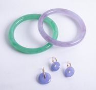 Two hardstone bangles and a pair of earrings and pendant, similar, together with a pair of white