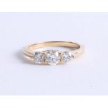 An 18ct yellow gold trilogy diamond ring, approx 1.00ct, size M.