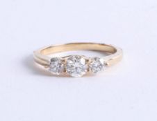 An 18ct yellow gold trilogy diamond ring, approx 1.00ct, size M.