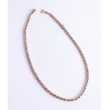 A 9ct rope twist bracelet, together with a 9ct gold bangle and a single stone tie pin (3) 6.9g.