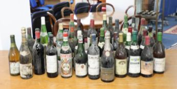 A collection of forty two bottle of various wines, port and champagnes to include 1972 La Cour