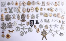 A collection of approx. 80 military cap badges including SAS, Glider Pilot Regiment and many