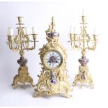 Three piece clock garniture set, with gilt casings and enamel decoration, movement signed 'Japy