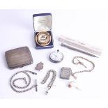 A silver cigarette case, silver cased pocket watch, silver vesta, ARP badge, guard chains and