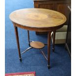 An Edwardian, oval, mahogany and inlaid occasional table.