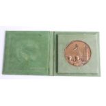 French medal anniversary Dunkirk, 1980, bronzed, cased together with collection of books on