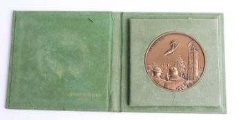 French medal anniversary Dunkirk, 1980, bronzed, cased together with collection of books on