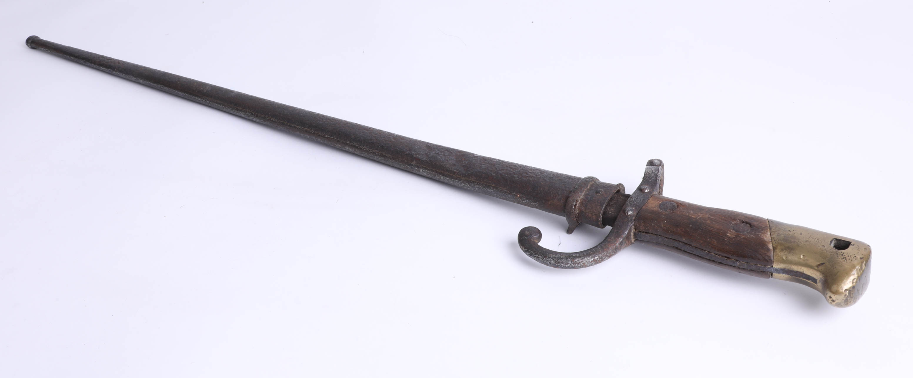 A 19th bayonet with metal scabbard, 66cm.