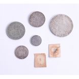 A Maria Theresa Thaler 1780, and four other coins.
