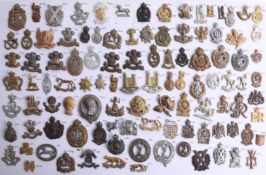 A collection of approx. 104 military cap badges, mostly county yeomanry's. Part of the Late Reverend