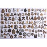 A collection of approx. 104 military cap badges, mostly county yeomanry's. Part of the Late Reverend